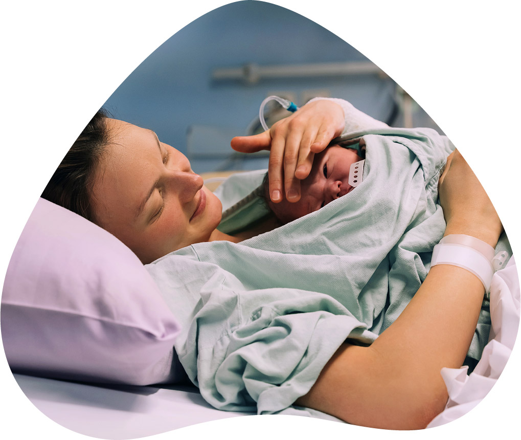 mother holding baby